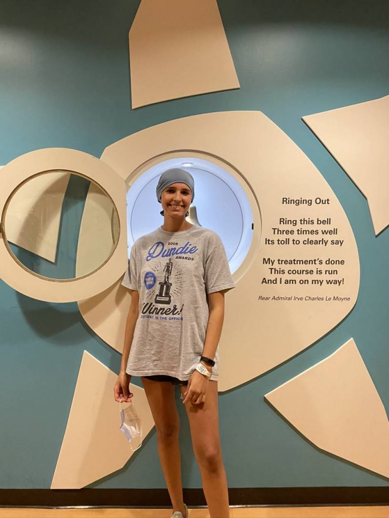 Macey Hicks rings the bell at MD Anderson Cancer Center