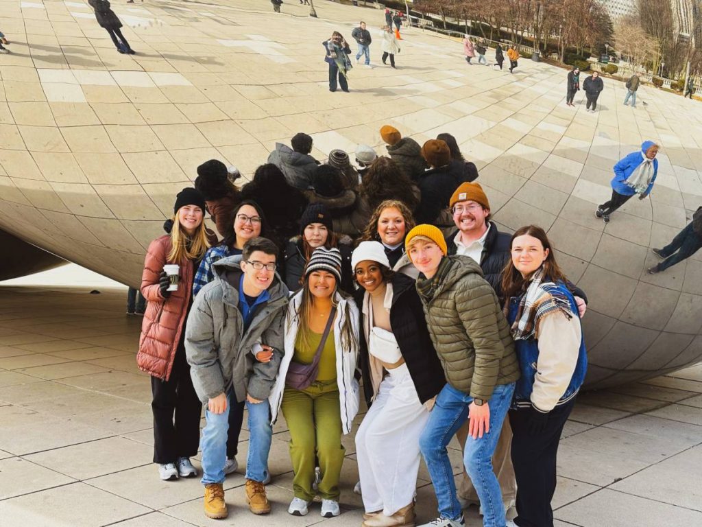 Ethan and friends pose for a picture in front of the famous Bean (Cloud Gate) in Chicago, Illinois.